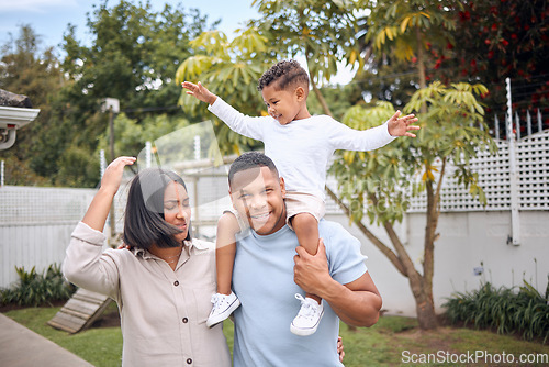 Image of I love my squad. a beautiful family having fun with their daughter in their backyard at home.