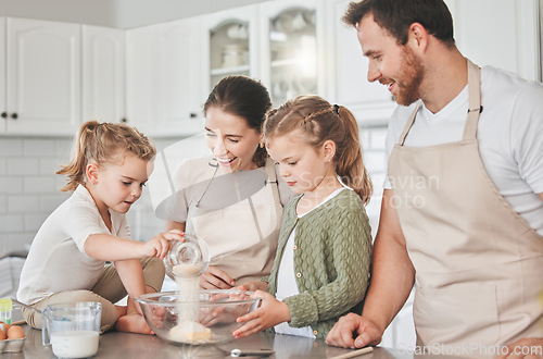 Image of Baking is like painting or writing a song. a family baking together in the kitchen.