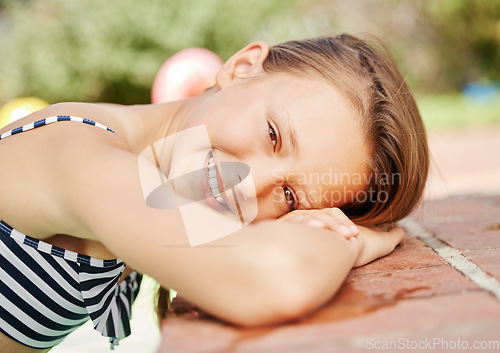 Image of Have some sun for fun. an adorable little girl outside on a sunny day.