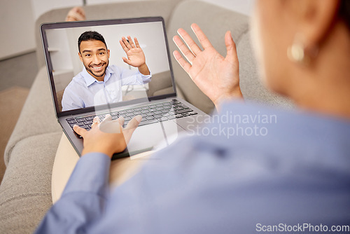 Image of Nice to see oyu. a unrecognizable female on a video call on a laptop at home.