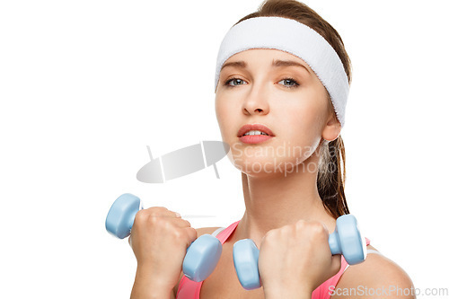 Image of I wont need your help to life anymore. a young woman using weights against a studio background.