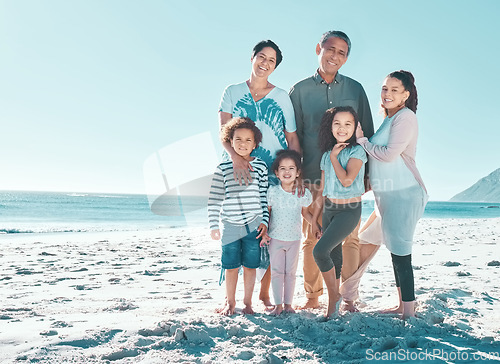 Image of Its always a good day at the beach. a multi-generational family spending the day at the beach.