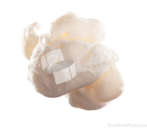 Image of Ready to pop. a popped piece of popcorn against a studio background.