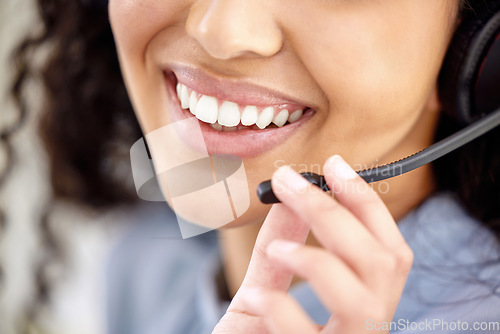 Image of Let me know if you need any assistance. Closeup shot of an unrecognisable businesswoman wearing a headset while working in a call centre.