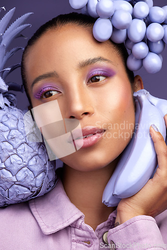 Image of Do you know whats on my mind...Studio shot of a beautiful young woman modelling a purple colour concept.