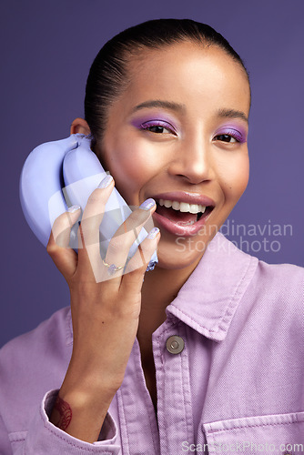 Image of Calling all purple lovers. Studio shot of a beautiful young woman modelling a purple colour concept.