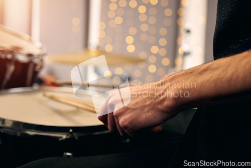 Image of Listen to the sound of the drum. an unrecognizable man playing the drums.