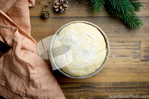 Image of bowl of dough for christmas bread baking