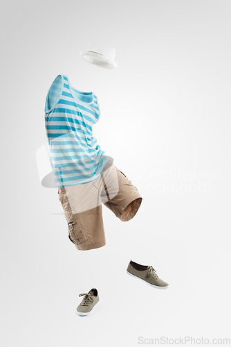Image of Just call me Mr Incognito. Studio shot of an invisible man dancing against a grey background.