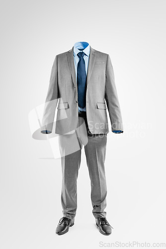 Image of Lets talk employee recognition. Studio shot of an invisible businessman standing against a grey background.