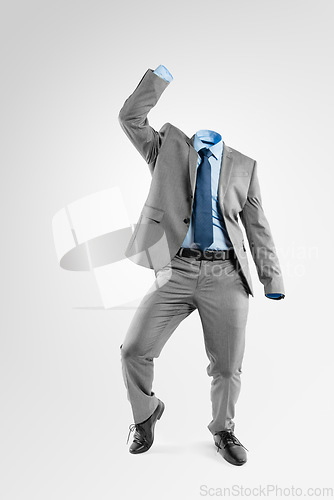 Image of You dont need my name, you just need to dance. Studio shot of an invisible businessman dancing against a grey background.