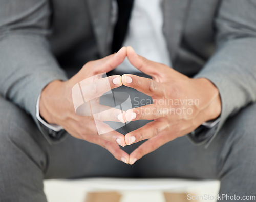 Image of These are anxious times. Closeup shot of an unrecognizables hands while sitting nervously in the studio.