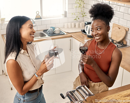 Image of Time to wine down. two young friends drinking wine together at home.