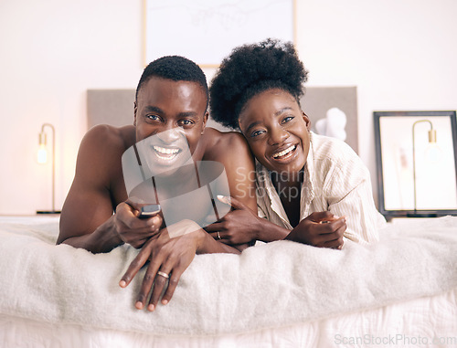 Image of Youre the best entertainment. a young couple watching tv together at home.