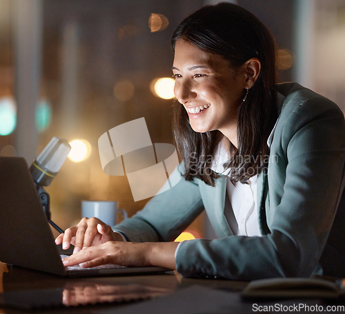 Image of Having a great time on the grind. an attractive young businesswoman working late at her company offices.