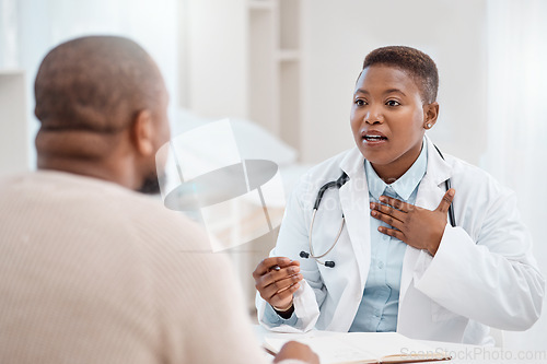 Image of Shes clear and thorough in her diagnosis. a young doctor having a consultation with a patient in a medical office.