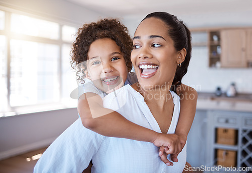 Image of Happiness is mother and daughter time. Portrait of a little girl bonding with her mother at home.