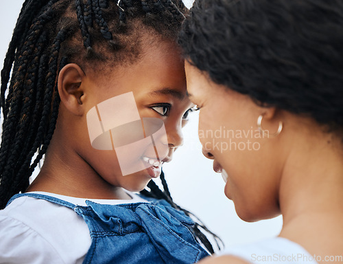 Image of The twinkle in my eye. a mother and daughter bonding at the beach.