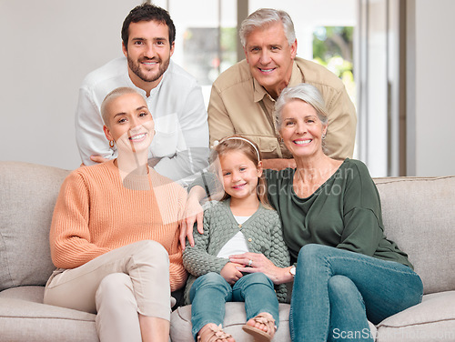 Image of Weve watched them grow. Portrait of a happy family bonding on the sofa at home.