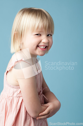 Image of Youll never guess what I did. a mischievous little girl against a studio background.
