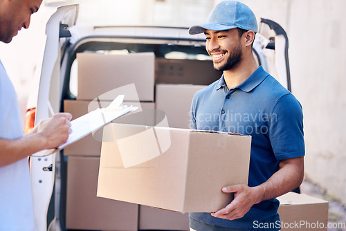 Image of Men are rich only as they give. a young man receiving his delivery from the courier.