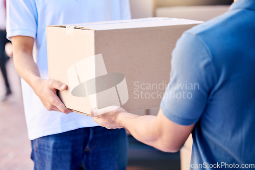 Image of Spend your energies on moving forward. a unrecognizable delivery man handing over a package to a client outside.