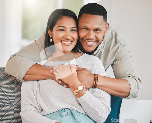 Image of Near and dear for life. Portrait of a young couple relaxing at home.