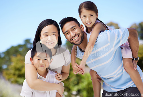 Image of Family matters most. a young family spending time together in their garden at home.