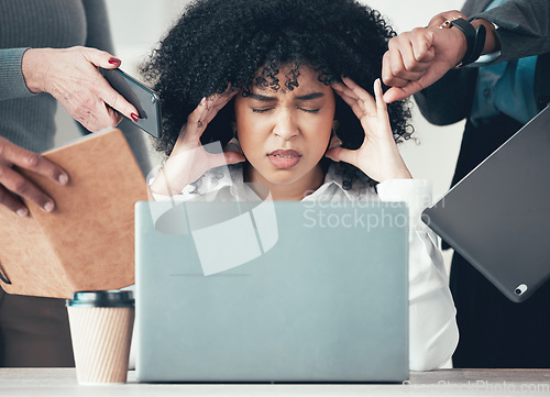 Image of Youre giving me a headache. an attractive young businesswoman sitting in the office and feeling stressed while her colleagues put pressure on her.