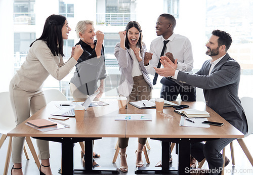 Image of Every success is a team effort. a group of businesspeople cheering in a meeting at work.