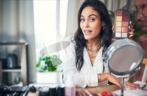 Image of The only drama we want, is on our eyes. a influencer recording a makeup tutorial for her blog at home.