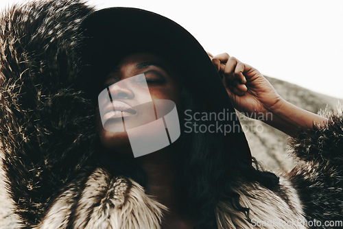 Image of Fashion at the beach. an attractive woman posing on the beach.