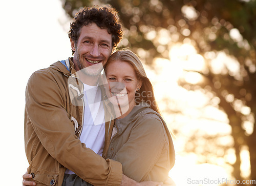 Image of Two in love. A cropped portrait of a happy affectionate couple standing together outdoors.