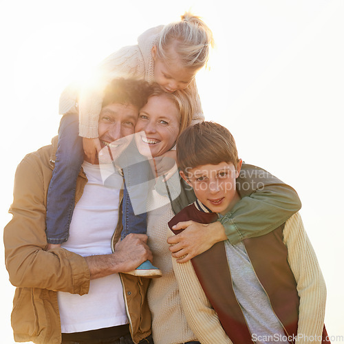 Image of Keep your loved ones close. Cropped portrait of a loving family standing together in the outdoors.