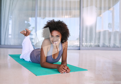 Image of Now thats what I call a workout. Full length portrait of an attractive young woman lying on an exercise mat.