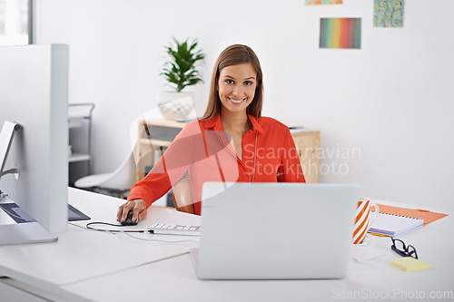 Image of Before anything else, preparation is the key to success. Portrait of a young woman sitting at work in front of her laptop.