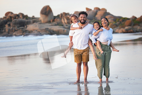 Image of Blind to the purpose of the brute divine. a beautiful family bonding while spending a day at the beach together.