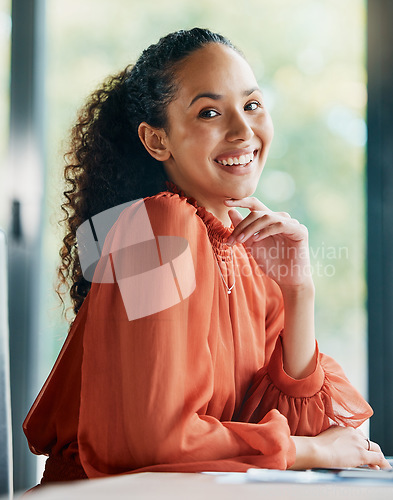 Image of Here to make my mark. Cropped portrait of an attractive young businesswoman sitting at her desk in the office.