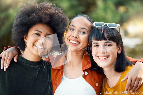 Image of Charming gardeners who make our souls blossom. a group of female friends spending time together at a park.