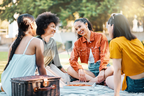 Image of A friend is the best things you can be. a group of friends sitting in a park.