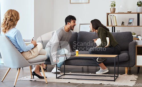 Image of Your mental disorder doesnt have to define you. Seek help. a couple having an argument during a counseling session with a therapist.