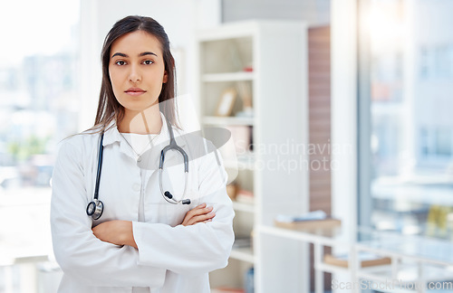 Image of Lets be serious. a young female doctor standing with her arms crossed in her office at a hospital.