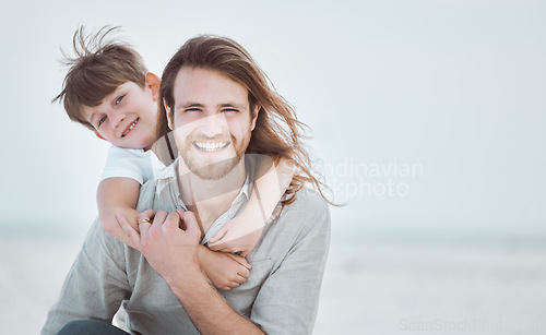 Image of Hes got a supporter for life in me. a young father and son spending time together at the beach.