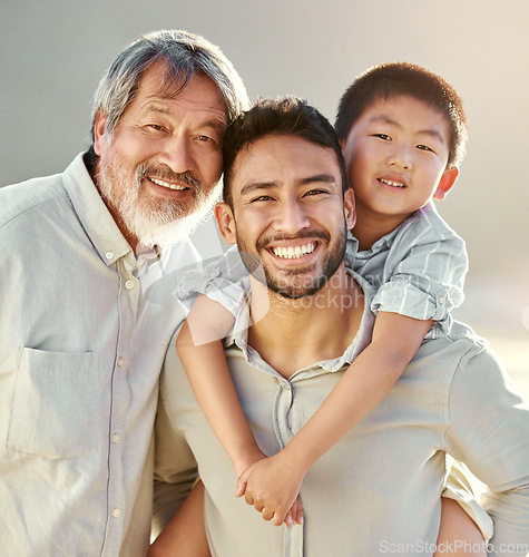 Image of The men in our family. Cropped portrait of a handsome young man on the beach with his father and son.