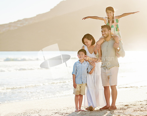 Image of Theres fun to be had on the beach. Full length shot of a happy diverse family of four at the beach.
