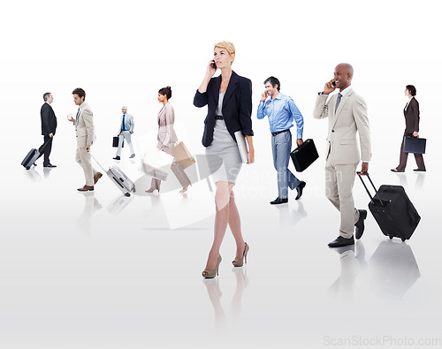 Image of Always on the go. businesspeople on the move with suitcases and cellphones.