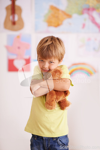 Image of My bear bestie. Portrait of a cute little boy hugging his teddybear.