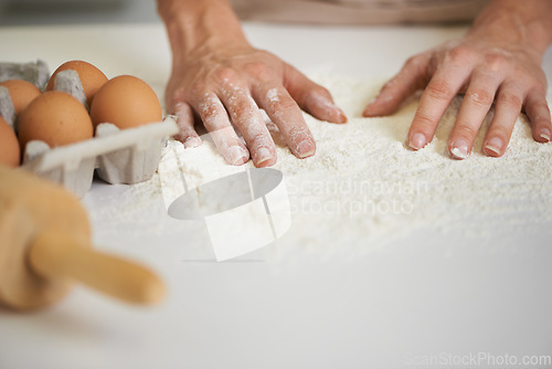 Image of The beginnings of a tasty treat. Closeup shot of a woman making dough.