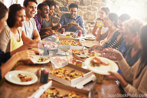Image of Catching up over great zza. a group of friends enjoying pizza together.
