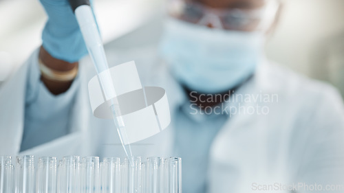 Image of Working towards the precise cure. a young scientist working with samples in a lab.